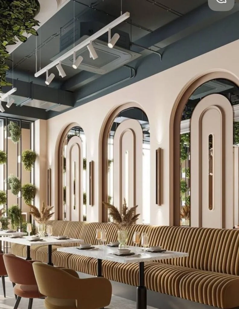Restaurant interior with arched wall panels and joinery finish